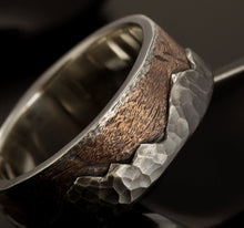 Side profile of the RS-1296 ring showing the heavy, layered metal construction