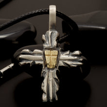 Detailed view of the P-156 pendant featuring the radiant Solid 14K Gold shield and the finely engraved cross