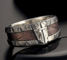 Handmade 10mm wide ring with a raw textured copper center and dark hammered sterling silver edges, model 1162