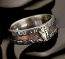 Rustic brutalist mens ring 1162 worn on a finger, highlighting its bold 10mm width and masculine style.