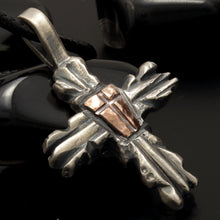 The P-156 shield cross pendant displayed next to an elegant black jewelry gift box and a polishing cloth