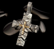 Small handmade sterling silver cross pendant with solid 14k gold center, elegant religious necklace.