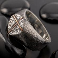 Front view of RS-1425 mens signet ring, featuring a raised copper cross on a rugged sterling silver shield.