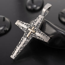Front view of the P-177 cross pendant, featuring a 14K gold cross on a rugged sterling silver base.