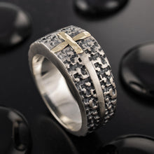 Side view of the RS-1428 ring highlighting the deep organic texture of the silver band and the secure placement of the gold cross.