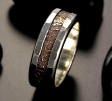 Detailed view of the textured copper inlay and rugged sterling silver edges of model 1411